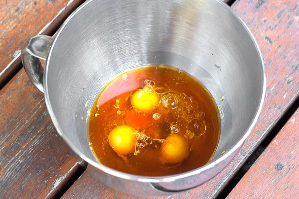 Eggs and oil in a bowl | BakingGlory.com