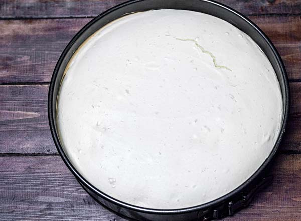 Baked cheesecake batter still in the pan